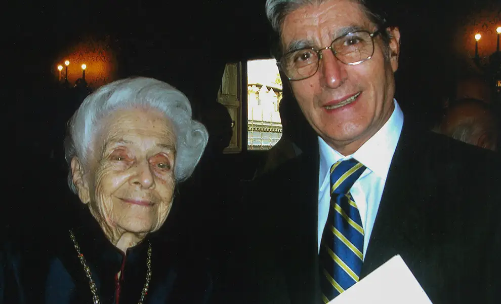 Il prof. Franco Henriquet ritratto insieme a Rita Levi Montalcini.